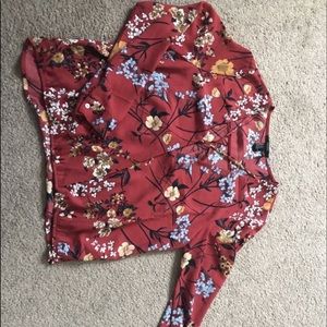 Red long sleve flowers and opens in the middle